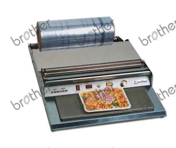 เครื่องห่อถาดอาหาร รุ่น HW-450 เครื่องห่อถาดอาหาร รุ่น HW-450