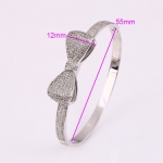 กำไลข้อมือทองคำขาว 18k white gold filled ดีไซน์สวยด้วยเพชร CZ ประดับรอบชิ้นริบบิ้น เปล่งประกาย