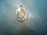เหรียญเล็กพระธาตุพนมพิธีบรรจุพระอุรังคธาตุปี20กาไหล่เงิน