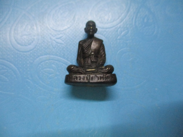 รูปหล่อหลวงปู่คำพันธ์วัดธาตุมหาชัยก้นอุดหินแม่น้ำโขงอุดเทียนชัย